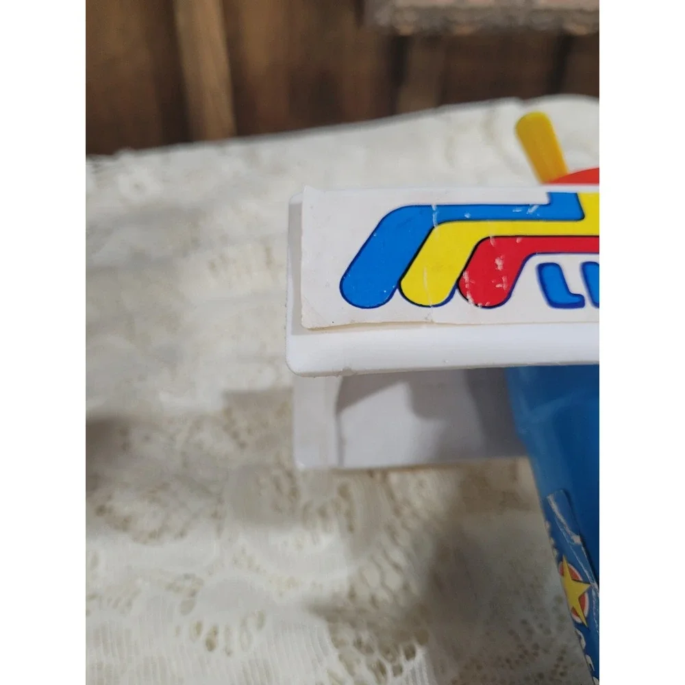 LIL ACE plastic airplane toy 1970s psychedelic stunt biplane w/ mustache man